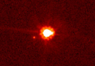 Illustration for article titled Meet Eris, The Solar System's Largest Dwarf Planet